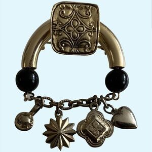Gold Charm Brooch with Black Accents